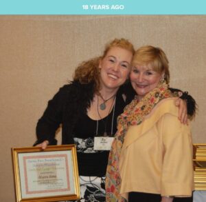 Alyson Hoag holding her Simple Abundance Certified Leader Training certificate nearly two decades ago, during the formative years when her mentor Sarah Ban Breathnach — author of Simple Abundance and Something More — inspired the philosophy that would become the Image Journey Makeup Experience in Atlanta.