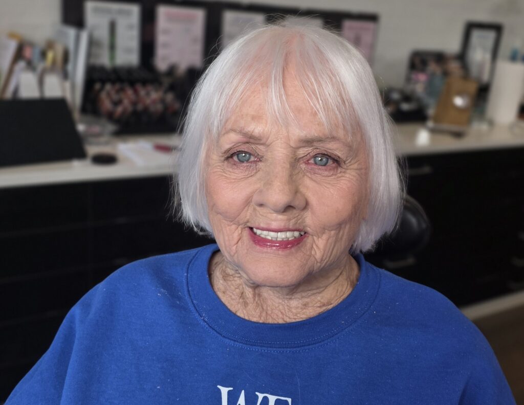 Smiling makeup client after a natural makeup application at Authentic Beauty Makeup Salon in Atlanta