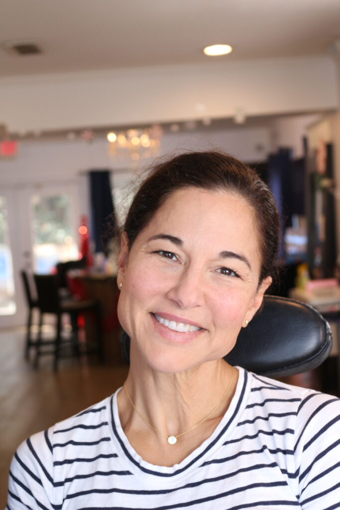 Woman smiling after a personalized Image Journey makeup lesson at Authentic Beauty Makeup Salon in Atlanta